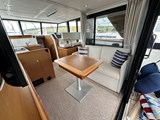 Saloon with sofa which can convert to extra berths